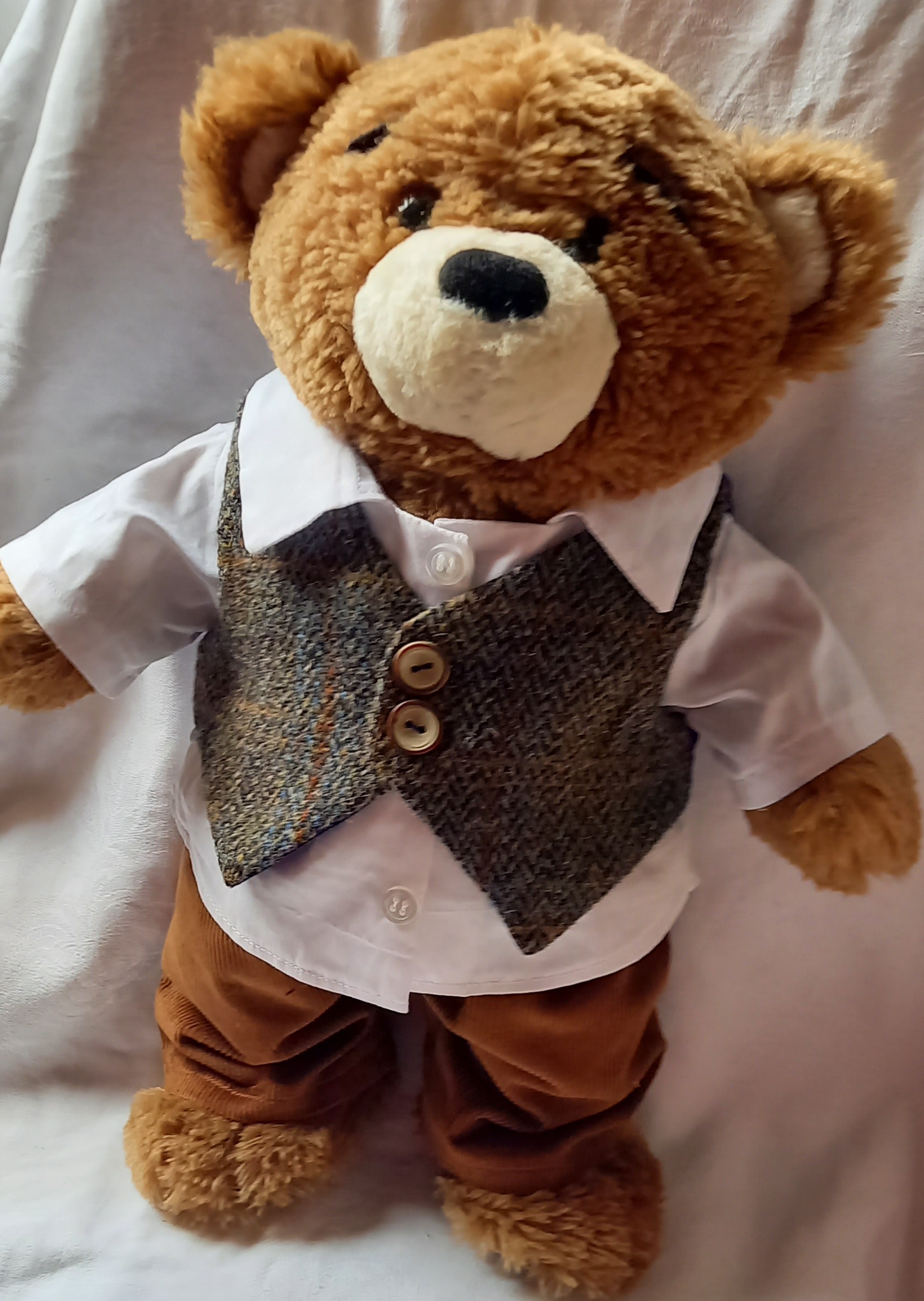 bear in jumper and cords